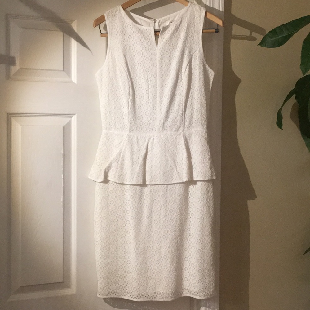 Beautiful white lace peplum dress